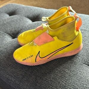 Nike Zoom mercurial indoor soccer shoes that have been outdoors.